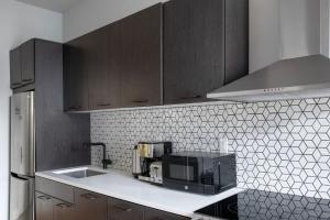 A kitchen or kitchenette at East Village 1br w doorman wd nr Union Square NYC-1153
