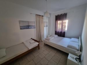 Posteľ alebo postele v izbe v ubytovaní Lucas Lux Flogita apartment