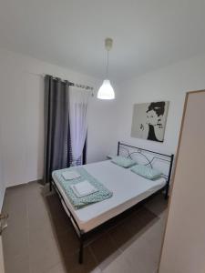 Posteľ alebo postele v izbe v ubytovaní Lucas Lux Flogita apartment