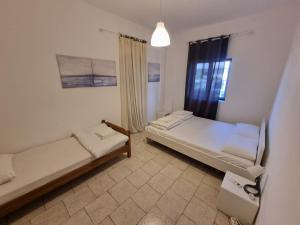 Posteľ alebo postele v izbe v ubytovaní Lucas Lux Flogita apartment