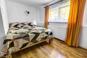 Łóżko lub łóżka w pokoju w obiekcie Willa Wladyslaw - centrum Krynicy, parking w cenie!