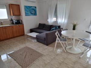 Kuchyňa alebo kuchynka v ubytovaní Lucas2 Lux Flogita apartment