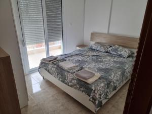 Posteľ alebo postele v izbe v ubytovaní Lucas2 Lux Flogita apartment