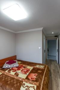Posteľ alebo postele v izbe v ubytovaní Hotel Intourist