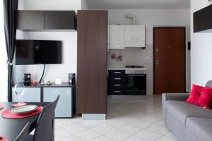 Nhà bếp/bếp nhỏ tại Bella Ciao Airport Apartment