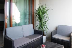 Posezení v ubytování Bella Ciao Airport Apartment