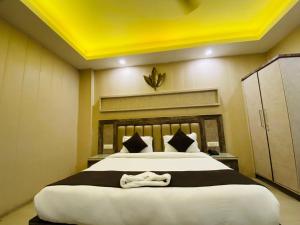 Postel nebo postele na pokoji v ubytování Hotel Mahajan International, Delhi Airport