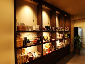 a display case in a store with many items at Arima Royal Hotel in Kobe