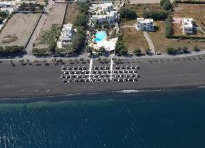 an aerial view of a resort on the beach at Atlantis Beach Villa in Perivolos