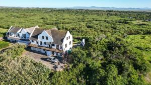 an aerial view of a large white house at WitsEnd Almost Heaven in St Francis Bay