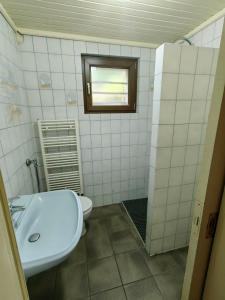Ванна кімната в Ferienwohnung Speicher