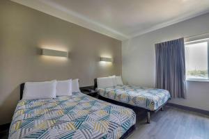 Postel nebo postele na pokoji v ubytování Motel 6-Cedar Park, TX