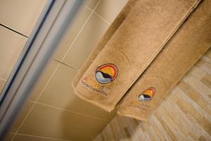 a brown towel on the side of a shower at Viviendas Vacacionales Amanay in Gran Tarajal