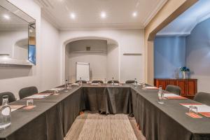 a large long table in a room with chairs at Muthu Westcliff Hotel (Near London Southend Airport) in Southend-on-Sea +127 photos