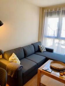 Posedenie v ubytovaní Apartament dúplex amb vistes al Pirineu català
