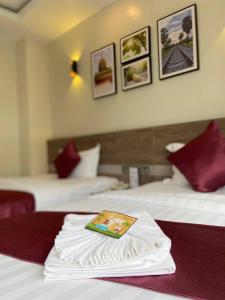 Twin Hotel Kampot客房内的一张或多张床位
