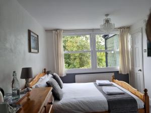 Postel nebo postele na pokoji v ubytování Fellview Guest House