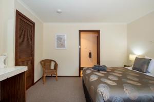 Ardrossan Hotel Motel客房内的一张或多张床位