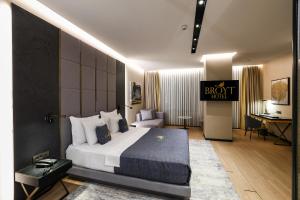 a hotel room with a bed and a desk at Broyt Hotel in Istanbul