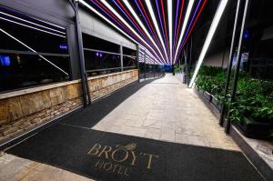 a sign on a sidewalk in front of a hotel at Broyt Hotel in Istanbul
