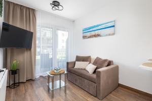 Zona d'estar a Apartments with Parking - Klimaty Baltyku by Renters