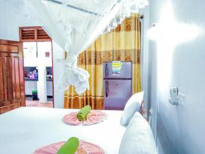 Kuchyň nebo kuchyňský kout v ubytování Bloom Guest House