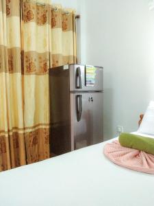 Kuchyň nebo kuchyňský kout v ubytování Bloom Guest House