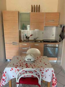 a kitchen with a table with a pot on it at IL SENSO DI LIBERTA' in Rieti