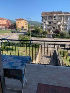 a balcony with a table and a skate park at IL SENSO DI LIBERTA' in Rieti