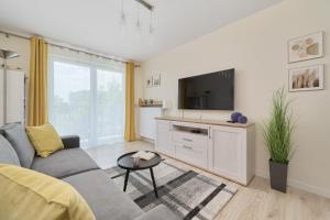 Et tv og/eller underholdning på Apartment Piękna with PARKING Wrocław by Noclegi Renters