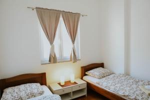 Postel nebo postele na pokoji v ubytování Beachfront House Amaris