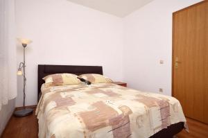 Postel nebo postele na pokoji v ubytování Apartment Srima