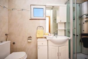 Koupelna v ubytování Apartment Srima