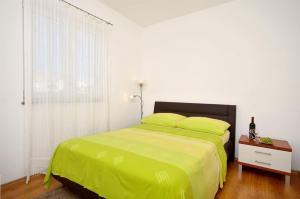 Postel nebo postele na pokoji v ubytování Apartment Srima