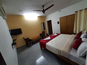 Postel nebo postele na pokoji v ubytování French Park Inn