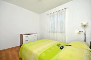 Postel nebo postele na pokoji v ubytování Apartment Srima