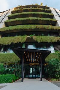a building with plants growing on it at The Reserve - The Leading Hotels of the World - Savoy Signature in Funchal