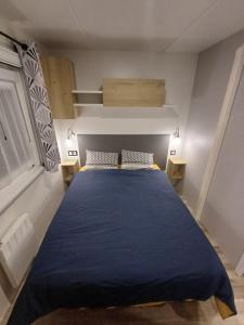 Mobil-home Camping Siblu La Reserve ****客房内的一张或多张床位