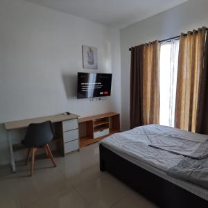 Fotografie z fotogalerie ubytování Affordable Condo w/ Shower Heater and Wi-Fi v destinaci Minglanilla