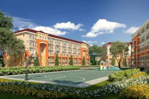 an architectural rendering of an apartment complex with a basketball court at AiPad Condo Rentals in Davao City