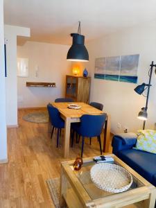 Posedenie v ubytovaní Apartament dúplex amb vistes al Pirineu català