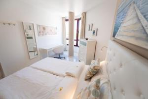 A bed or beds in a room at Viviendas Vacacionales Amanay