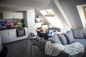Η κουζίνα ή μικρή κουζίνα στο Bienvenue dans le cyan 2 à 6 couchages +43 φωτογραφίες