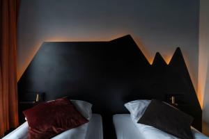 Postel nebo postele na pokoji v ubytování Melbu Hotell