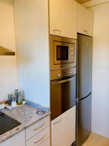 Kuchyňa alebo kuchynka v ubytovaní Apartament dúplex amb vistes al Pirineu català