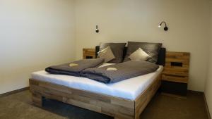 Postel nebo postele na pokoji v ubytování Kaunergrat Appartement