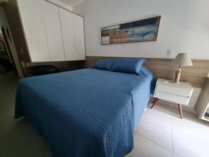 Ένα ή περισσότερα κρεβάτια σε δωμάτιο στο Ubatuba DNA +44 φωτογραφίες