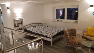 מיטה או מיטות בחדר ב-FeWo Steingasse