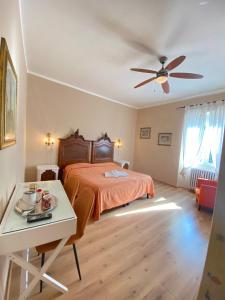 Postel nebo postele na pokoji v ubytování Hotel Dali