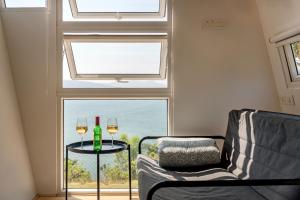 Area soggiorno di Twist, Tiny home on the Cliff